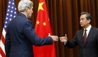كيري: واشنطن قلقة من نشاط بكين في بحر الصين الجنوبي